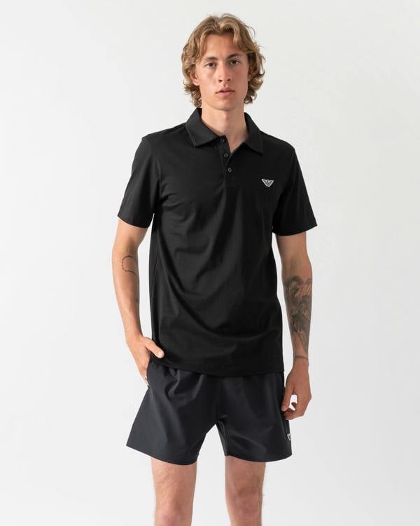 model wearing an Emporio Armani Mens Beach Polo with Eagle Logo in Black