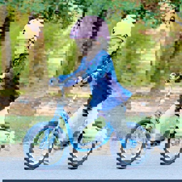 Girl on WeeRide Kazam Balance Bike