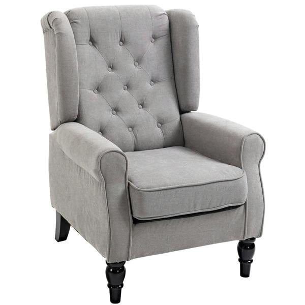 Light grey wingback armchair with button-tufted back and rolled arms