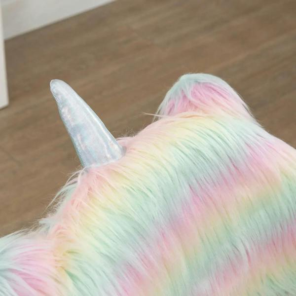 Close-up of rainbow fluffy unicorn-themed chair back with horn detail