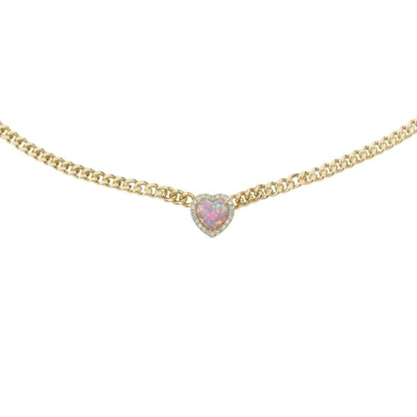 Gold necklace with a heart-shaped pink gemstone on a white background