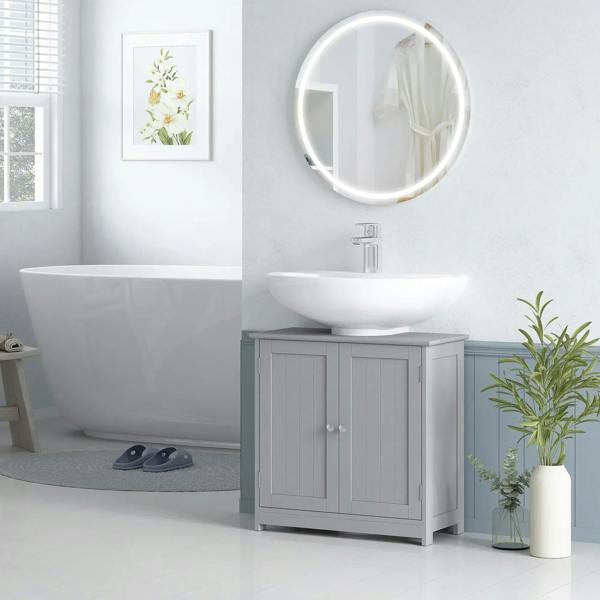Grey freestanding under-sink cabinet with two doors beneath a white basin
