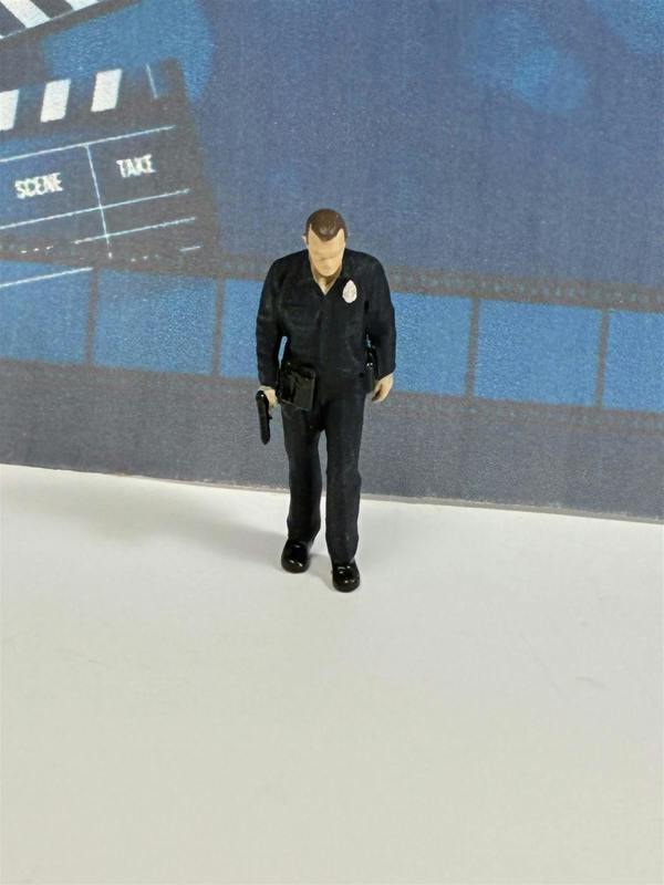 a toy figure of a police officer
