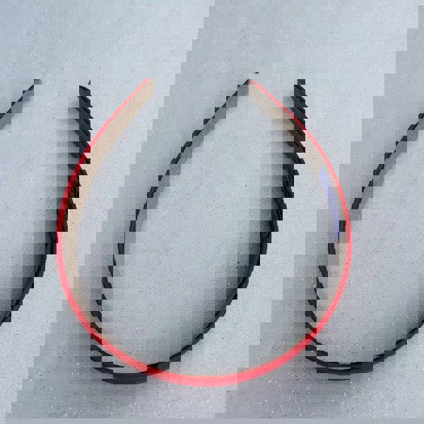 Red hairband, smooth satin finish, slim padded design, vibrant red colour, classic everyday accessory, minimalist headband style
