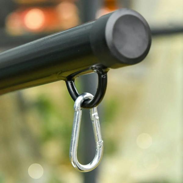 Swivel snap hook attached to black steel hammock stand bar