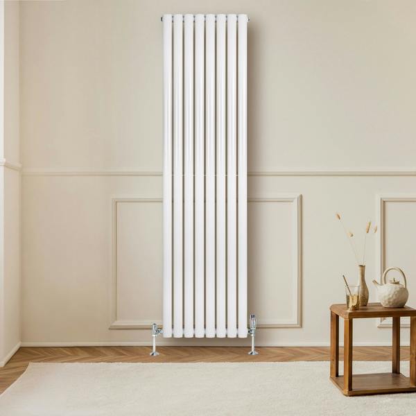 Sleek white oval single column radiator with valves, measuring 1800mm x 480mm, mounted on a light-colored wall in a modern room