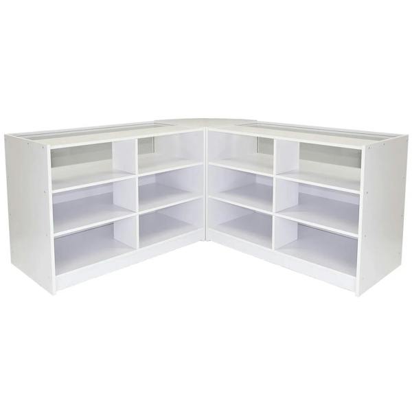Brilliant white retail display set featuring a modern corner shop counter with multiple open shelves for organized product presentation