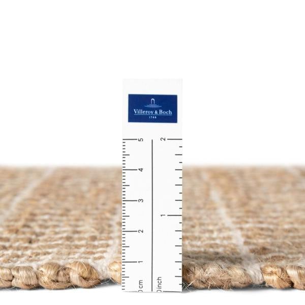 Rug with a ruler for scale and Villeroy & Boch logo