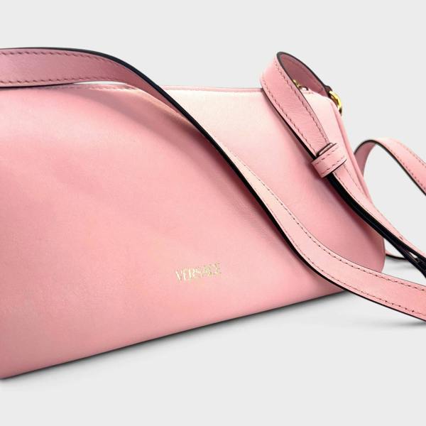 Supplied Fashion rose pink Versace Medusa crossbody bag with adjustable leather strap and gold logo detail