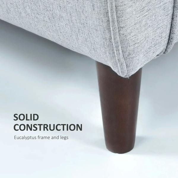 Light grey fabric sofa with solid dark wooden legs
