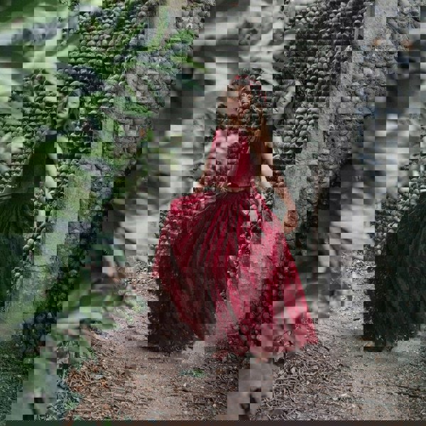 girl wearing a Burgundy Lace 2 piece set