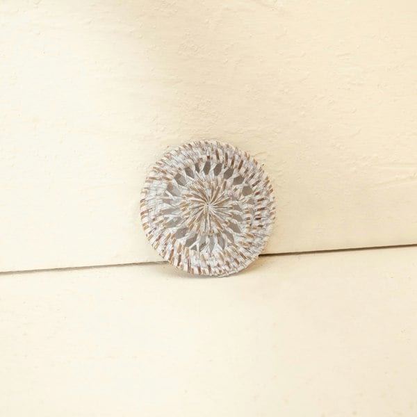 Rattan spiral coaster set close up handwoven wicker table mat