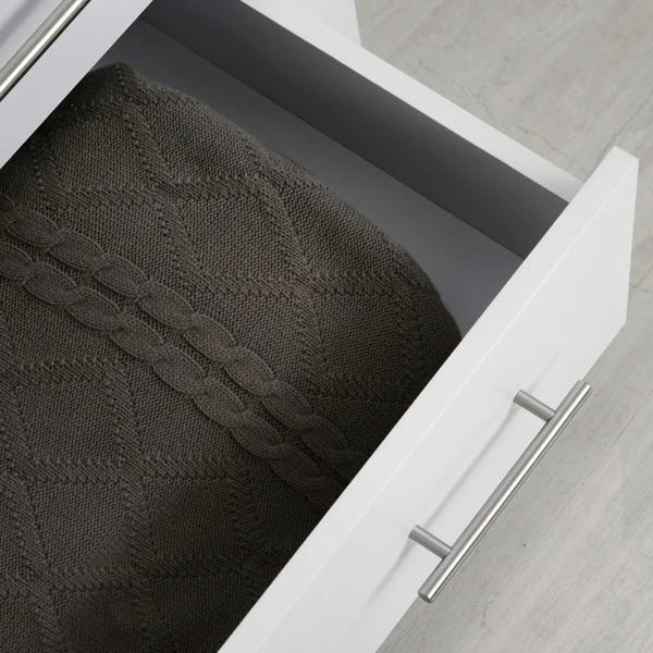 White open drawer with metal bar handle, showing dark knitted fabric inside cabinet