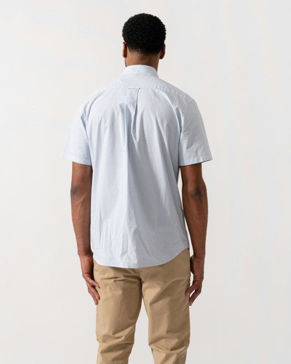 Model wearing a GANT Mens Regular Fit Classic Poplin Gingham Short Sleeve Shirt in 455 Light Blue - back