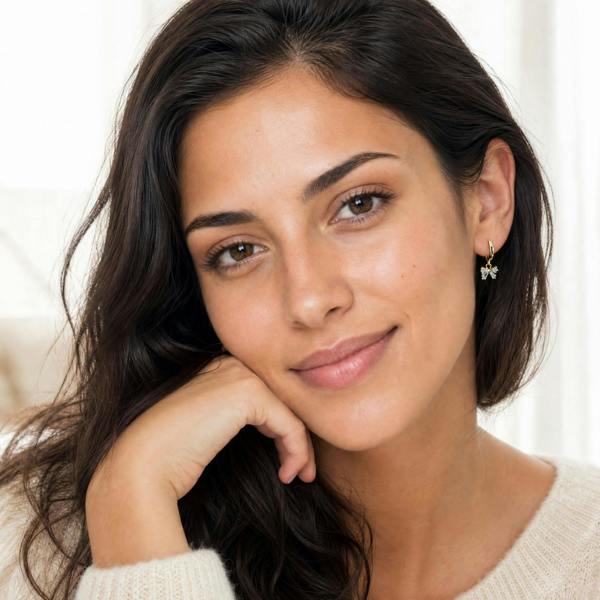 Gold Trip Crystal Bow Huggie Hoops