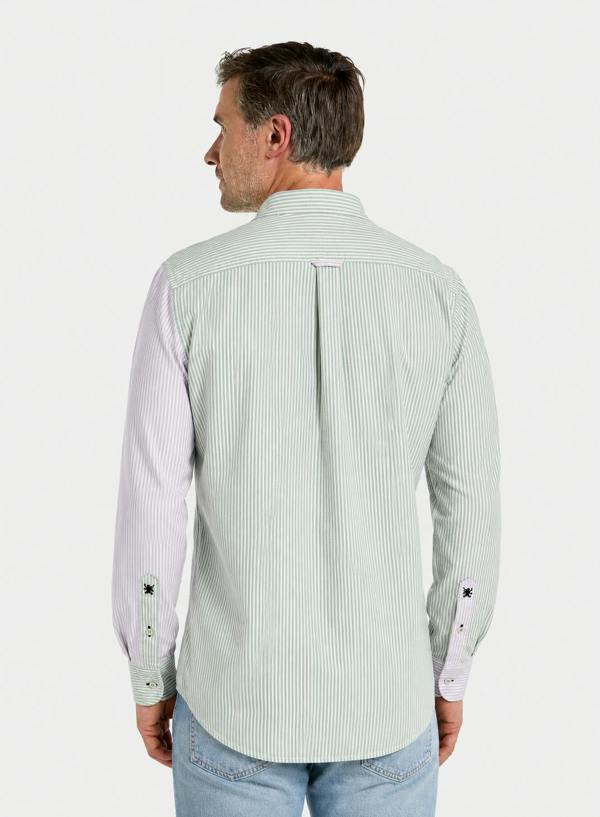 Rear view of man wearing a lilac and green patch stripe Oxford shirt with contrasting sleeves and back pleat