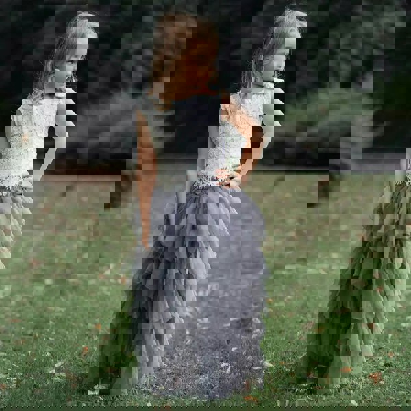 girl stood in gardens