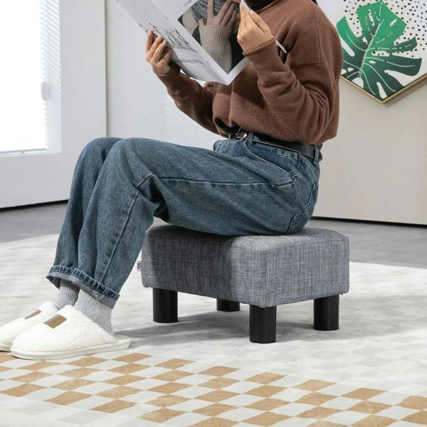 Grey linen ottoman footstool cube with black legs, sturdy padded seat