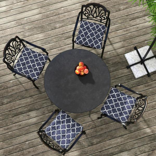 Set of navy blue seat cushion pillows with white trellis pattern; ties and rounded corners