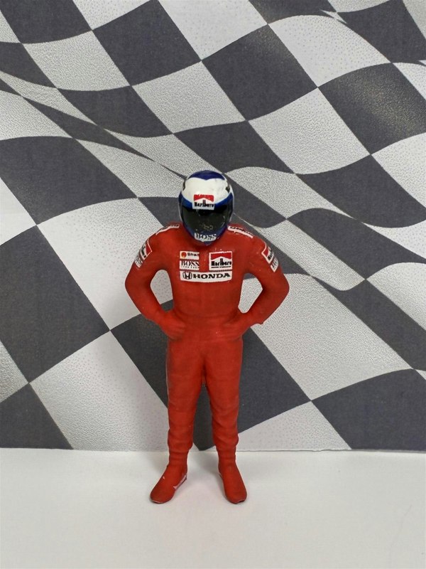 a toy figure in a red uniform
