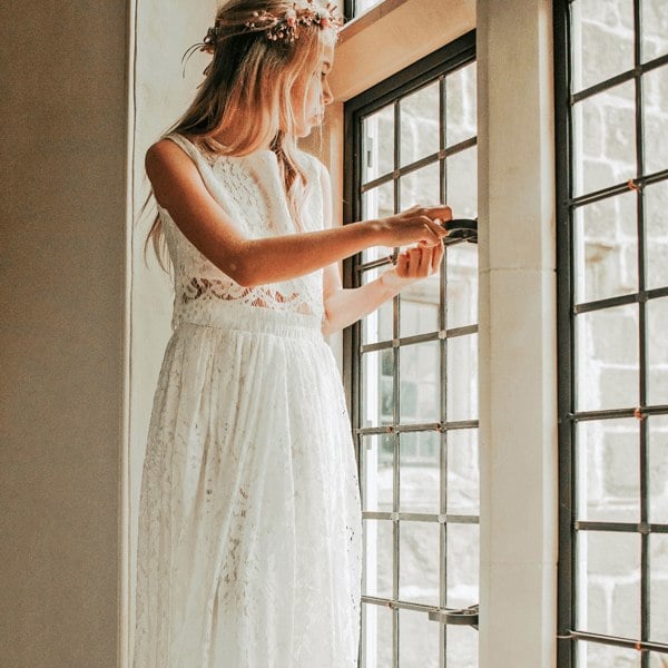 Girl in white lace top and skirt set