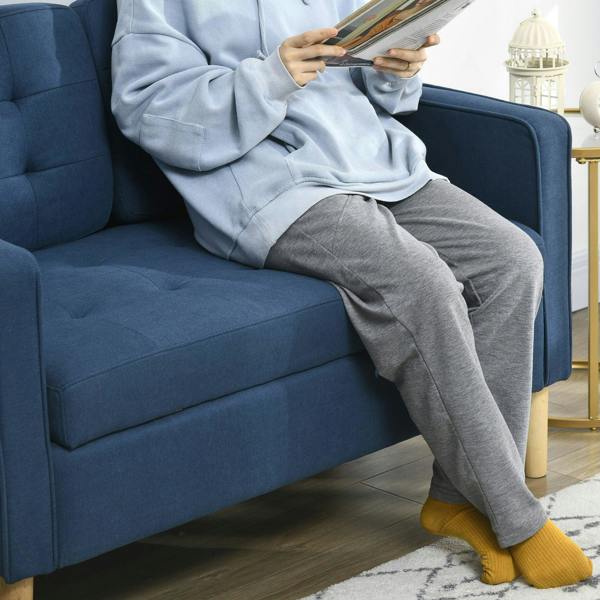 Blue upholstered loveseat sofa seat and armrest with cushioned back