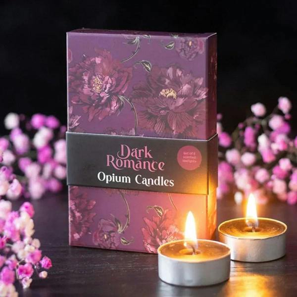 Set of 6 Opium tealight candles with two lit flames in metal cups