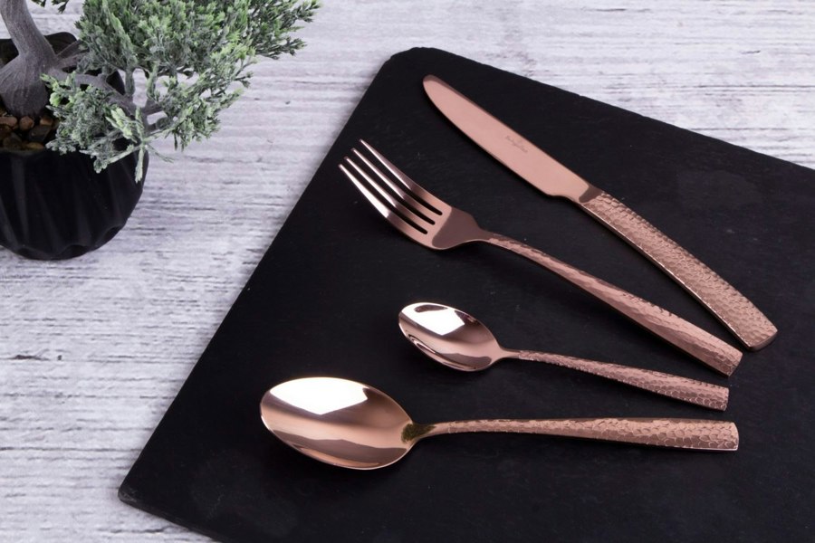 A close-up look at the intricate craftsmanship of the BH/2617 Rose Gold Cutlery Set, highlighting its elegant design.