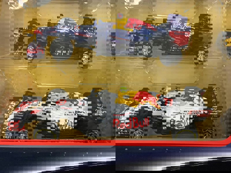 Red Bull Formula 1 Set of 7 Cars with Display Stand 1:43 Scale Bburago 38168