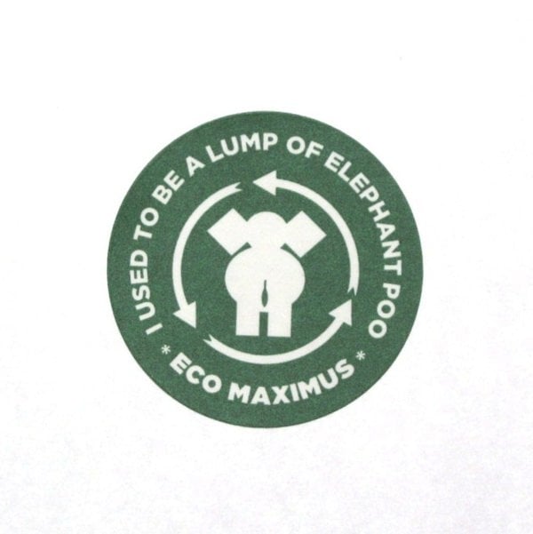 The green circular label features "I used to be a lump of elephant poo" and "Eco Maximus" with an elephant and recycling arrows, ideal for your Small Colourful Elephant Dung Notebook.