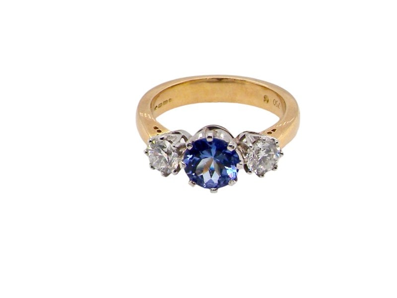 A three stone Tanzanite and Diamond Ring