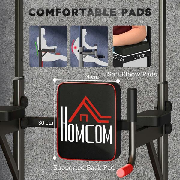 Padded back rest and elbow pads on black power tower dip station