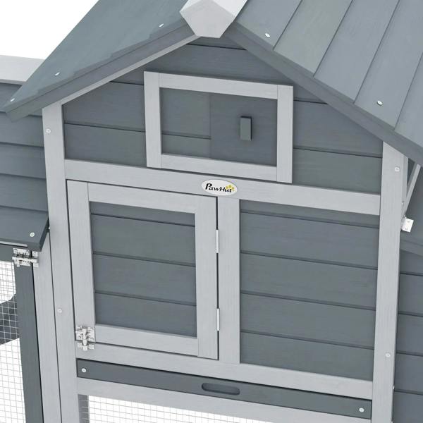 Grey chicken coop front with door panel and nesting box window opening