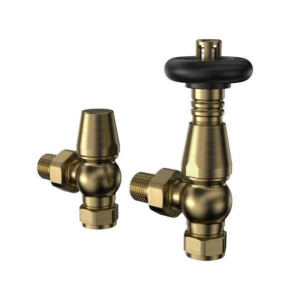 Brass radiator valves featuring a sleek design with a black top, showcasing a polished finish and durable construction