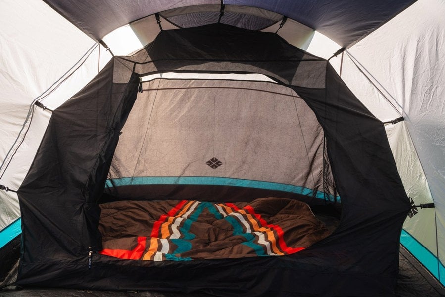 An image taken inside of the tent showing the bedroom pod of the Stafford 4.0 OLPRO x Ed Stafford with a blanko in the bedroom pod.