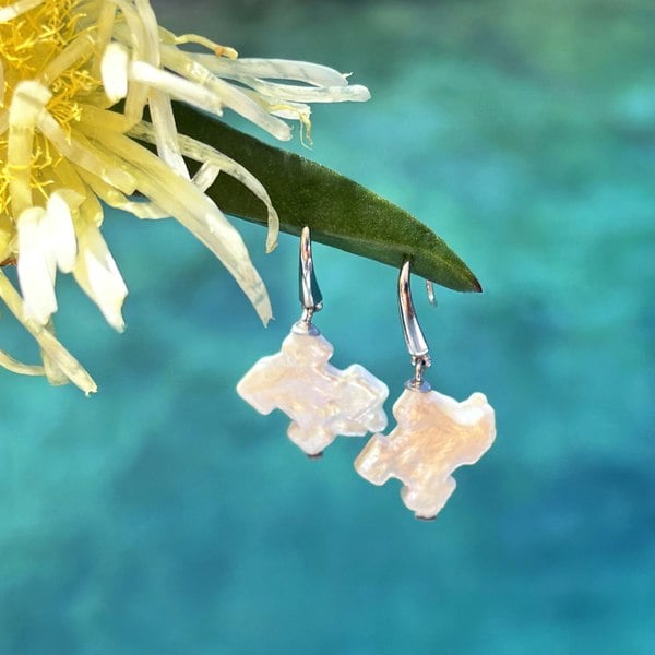 Silver earrings featuring baroque puzzle shaped irregular pearls, handcrafted by LENAE London.