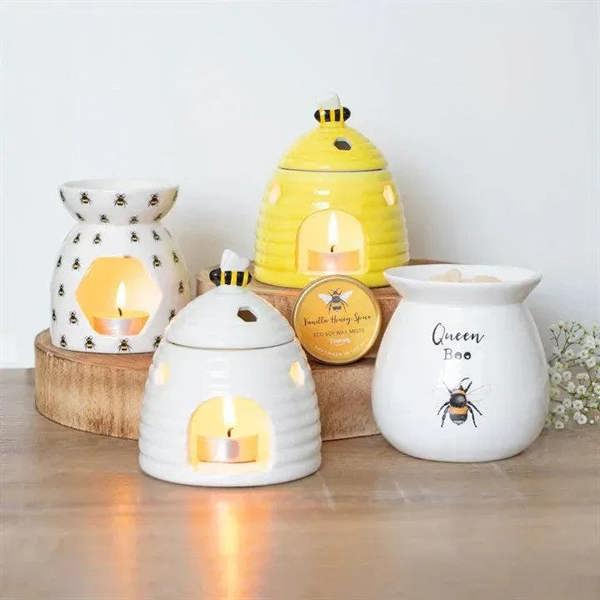 Ceramic beehive oil burners set: white and yellow with bee-pattern candle cups