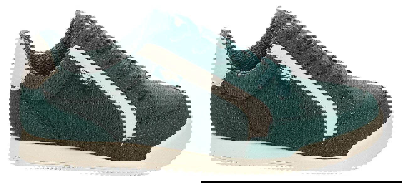 Rocket Dog Bolt Womens Casual Smart Lace Up Shoes Trainers, green and white sneaker with lace-up closure and comfortable sole.