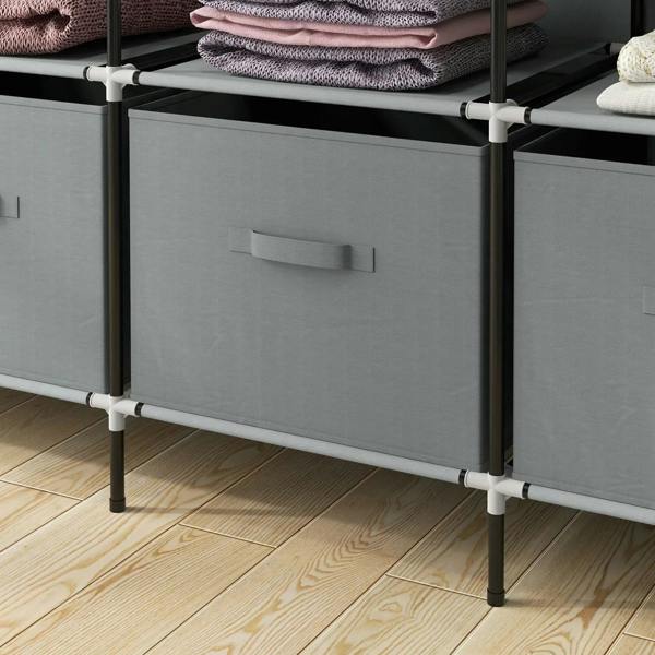 Dark grey fabric drawer fronts on a portable wardrobe frame with corner legs