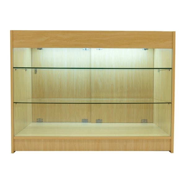 LED retail shop counter K1200 in maple finish, featuring glass shelves and built-in lighting for enhanced product display