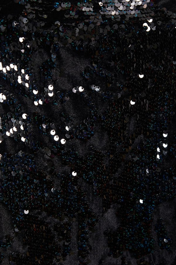 A close up image of a Sarvin Black Sequin Skirt fabric.