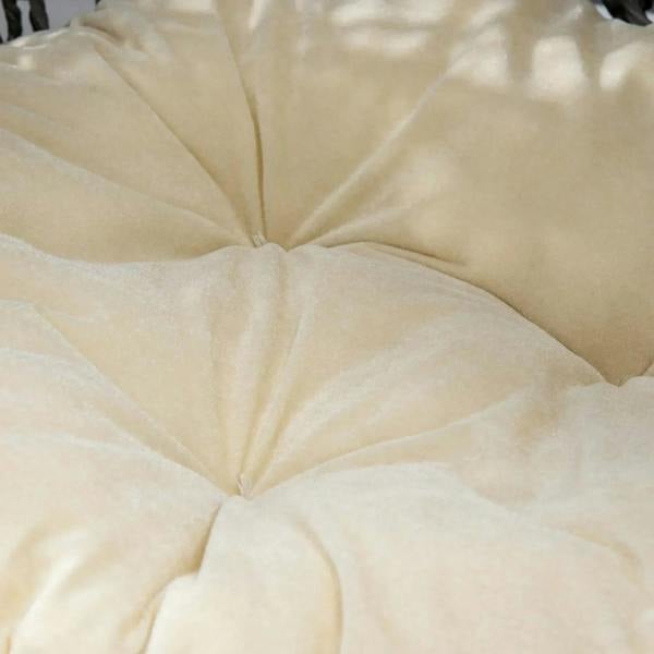 Close-up of cream removable cushion fabric with stitched, tufted look