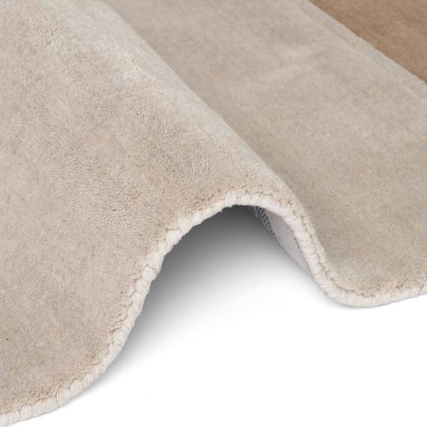 Pure wool rug, cream brown colours, soft durable pile, cotton backing, simple care, ideal for busy homes.