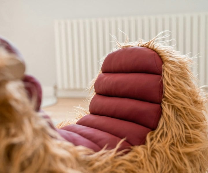 Curved padded seat of hubert highland cow toy 