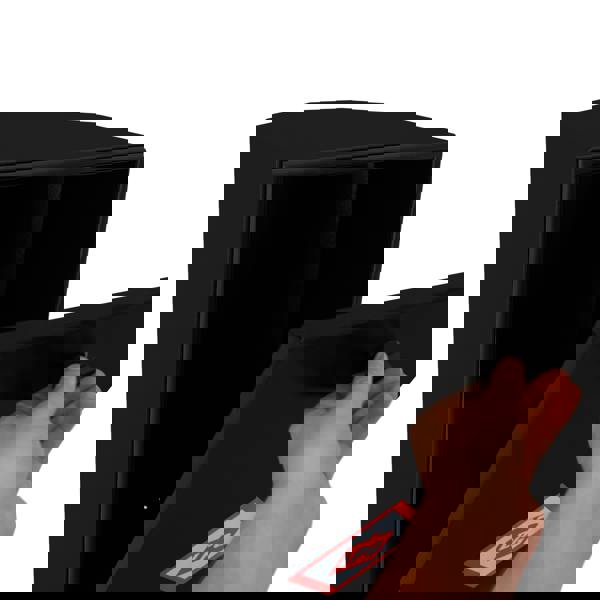 Black gas bottle locker with a hinged door, designed for securely storing 6kg LPG bottles, featuring a smooth finish and safety label