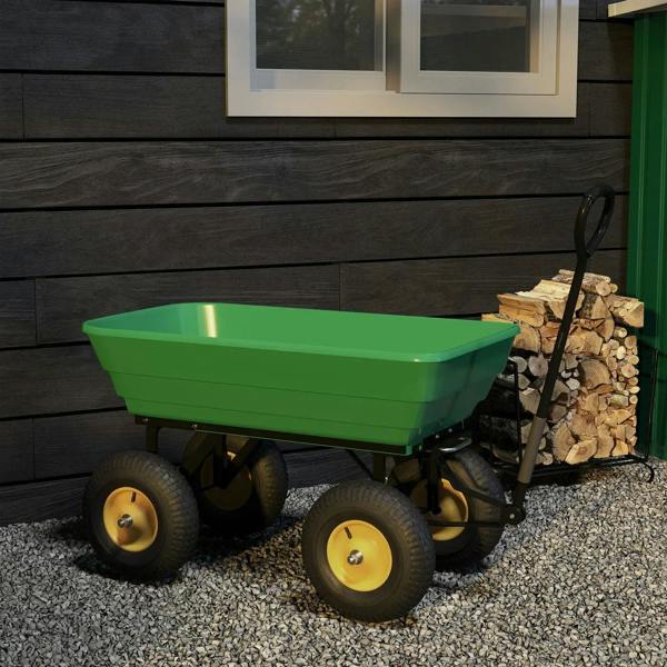 Green tipping garden cart with large yellow wheels and black frame on gravel