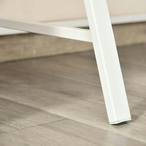 White metal desk leg and underside frame beneath oak-effect tabletop