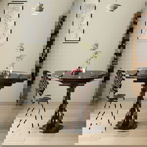 Caruso Round Folding Dining Table, Sintered Stone, Black in a lifestyle setting with 4 seater folding dining table