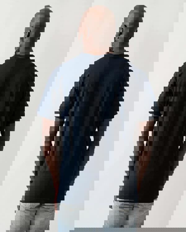 back shot of a Model wearing a Belstaff Surface Mens T-Shirt in Dark Ink