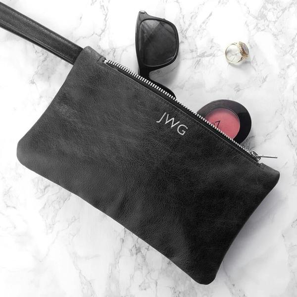 Monogrammed Leather Clutch Bag - close-up detail